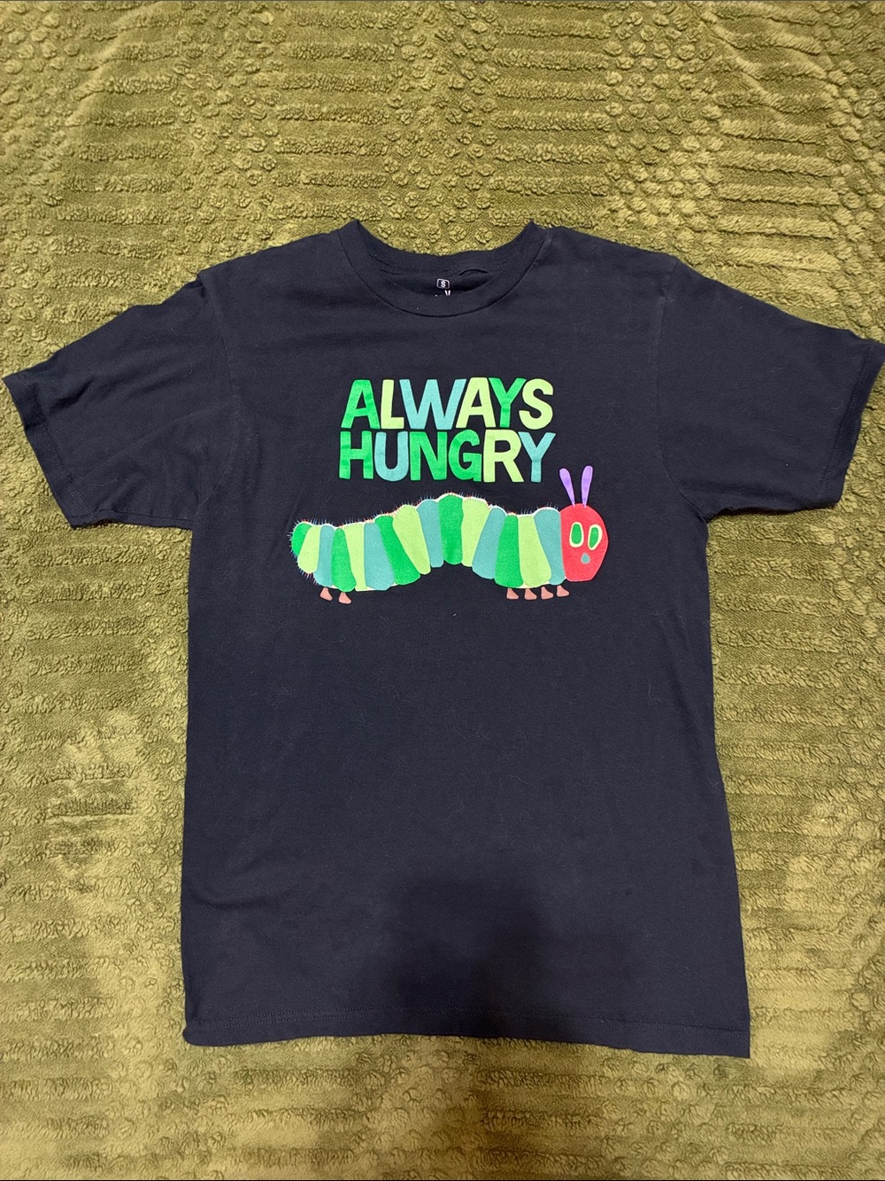 Ripple Junction Black Tee with Erik Carle Very Hungry Caterpillar Graphic